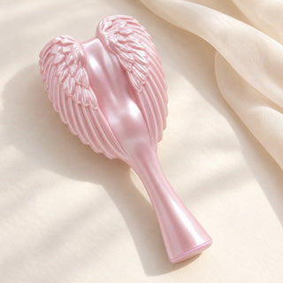 Pink Angel Hairbrush with pearly sculpted angel wings on cream silk