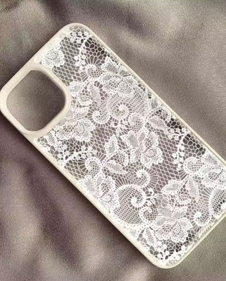 White Frame lace phone case on gray blanket