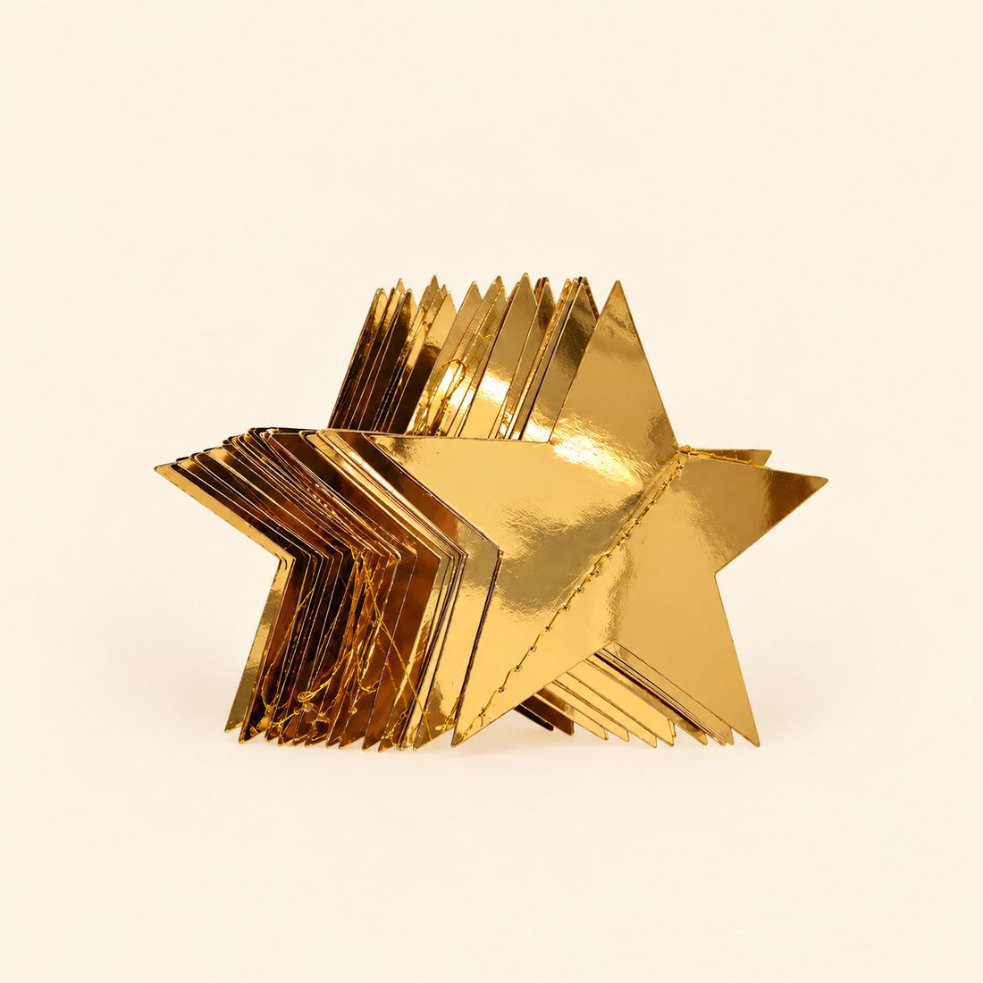 Gold star garland hanging over mirror
