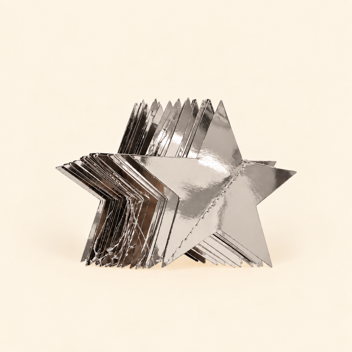 Silver star garland hanging over mirror