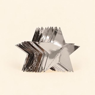 Silver star garland hanging over mirror