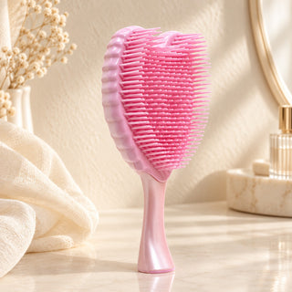 Pink Angel Hairbrush standing on a bathroom counter