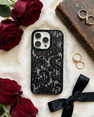 Black Frame lace phone case flat lay with red roses