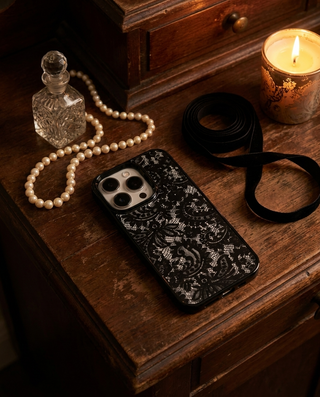 Black Frame lace iPhone case on a vintage vanity with pearls